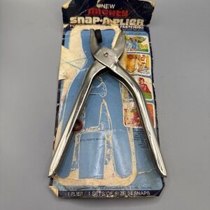 Vintage Scovill rivet tool used